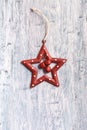 Vintage Christmas star decoration on blue painted wood Royalty Free Stock Photo