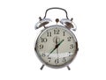 Vintage chrome alarm clock with bells isolated on white background with clipping path. Royalty Free Stock Photo