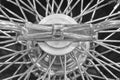 Vintage chrome hubcap detail in black and white Royalty Free Stock Photo