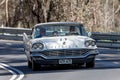 Vintage Chrysler driving on country roads