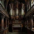 Vintage church organ, metal pipes, beautiful carved pattern on old wood