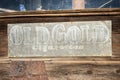 Vintage cigarette ghost sign outside old abandoned store at ghost town of Bodie, California Royalty Free Stock Photo