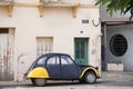 Vintage Citroen 2CV car parked on street outside house in France Royalty Free Stock Photo