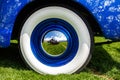 Vintage classic American blue car wheel Royalty Free Stock Photo