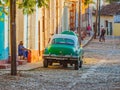 Vintage classic American car get repaired on the street Royalty Free Stock Photo