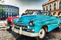 Vintage classic american car parked in a street of Old Havana Royalty Free Stock Photo