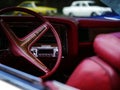 Vintage classic car dashboard and steering wheel medium shot Royalty Free Stock Photo