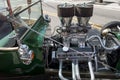 Vintage classic car with reflection of the street on its surface