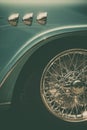 Vintage classic car wheel and air vents Royalty Free Stock Photo