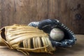 Vintage classic leather baseball glove and baseball ball isolated on white background. Royalty Free Stock Photo
