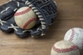 Vintage classic leather baseball glove and baseball ball isolated on white background. Royalty Free Stock Photo