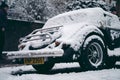 Vintage Classic Morgan Covered in snow on cold winter morning