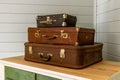 Vintage classic outdated trunks luggage, old antique leather suitcases. Travel baggage concept Royalty Free Stock Photo