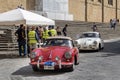 Vintage classic sports car engaged in a regularity competition in Arezzo