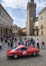 Vintage classic sports car engaged in a regularity competition in Arezzo