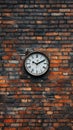 Clock mounted on a rustic brick wall showing the passage of time during daylight hours Royalty Free Stock Photo