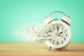 Vintage clock as time passing and pass away concept. Royalty Free Stock Photo