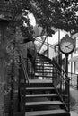 Vintage Clock and Spiral Stairs in Black and White