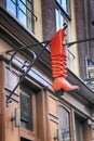 Vintage cobbler shop sign in Amsterdam, Netherlands Royalty Free Stock Photo