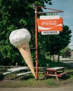 Vintage Coca Cola sign and giant ice cream cone, LIslet, QuÃÂ©bec, Canada Royalty Free Stock Photo