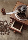 Vintage coffee grinder and beans Royalty Free Stock Photo