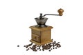 Vintage coffee grinder.Old retro hand-operated wooden and metal coffee grinder.Manual coffee grinder for grinding coffee beans. Royalty Free Stock Photo