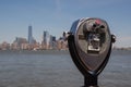 Vintage Coin-operated Binocular looking over Manhattan Skyline