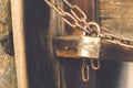 Vintage color for Old rusted lock with rusted chain Royalty Free Stock Photo