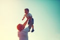 Vintage color photo happy joyful father throws up child