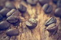 Vintage color tone, coffee beans on the old wooden Royalty Free Stock Photo