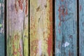 Vintage colorful wooden boards with weathered cracked paint