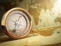 Vintage compass on the old world map. Travel concept. Royalty Free Stock Photo