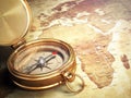 Vintage compass on the old world map. Travel concept. Royalty Free Stock Photo