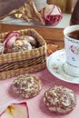 Vintage composition with cakes, coffee, old books and a dry rose Royalty Free Stock Photo