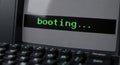 vintage computer close-up showing green booting text on display Royalty Free Stock Photo