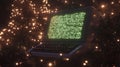 Vintage computer with green text screen in dark, surrounded by festive lights, palette of ruby red Royalty Free Stock Photo