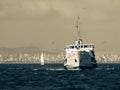 Vintage concept Istanbul passenger ferry going to Bosphorus strait full of vehicles, Istanbul, Turkey