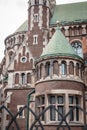 Vintage conical towers of a classic castle with green tiles Royalty Free Stock Photo