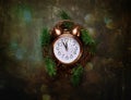 Vintage Copper Alarm Clock Five Minutes to Midnight New Years Countdown Christmas Wreath Fir Tree Branches on Black Background Gli Royalty Free Stock Photo