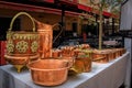 Vintage copper cookware pots and pans at a flea market in Old Town Nice, France Royalty Free Stock Photo