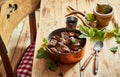 Vintage copper pot with spicy venison goulash Royalty Free Stock Photo