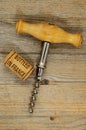 Vintage corkscrew and wine cork with inscription bottled in Fran