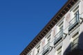 Vintage corner of old building in italian style against clear blue sky in Zaragoza, Spain. Copy space card template advertise Royalty Free Stock Photo