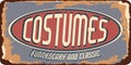 Vintage costumes metal sign.Retro poster 1950s style Royalty Free Stock Photo