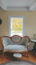 Vintage Couch with Footstool, Braided Rug