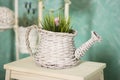 Vintage country house interior with a table with a vase and flovers