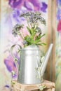 Vintage country house interior with a table with a vase and flovers Royalty Free Stock Photo