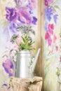 Vintage country house interior with a table with a vase and flovers Royalty Free Stock Photo