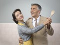 Vintage couple dancing in the kitchen