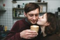 Vintage couple preparing coffee with vacuum coffee maker.Coffee